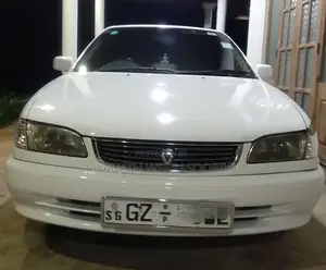 Photo - Toyota Corolla 2000 White