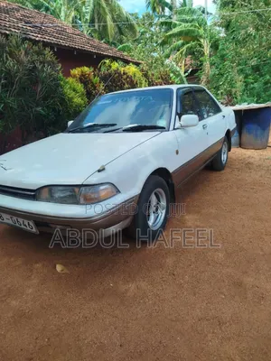 Photo - Toyota Carina 1988 White