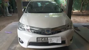 Photo - Toyota Axio 1.5 Hybrid 2WD 2014 Pearl