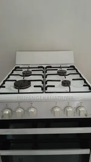 Photo - 4 - Burner Gas Stove With Oven