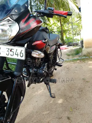 Photo - Bajaj Discover 150 2011 Red