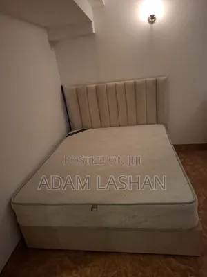 Light Used 2 Bedroom Set With 2 King Sized Spring Mattress and 2 Sofas