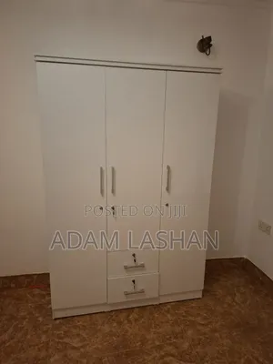 Light Used 2 Bedroom Set With 2 King Sized Spring Mattress and 2 Sofas