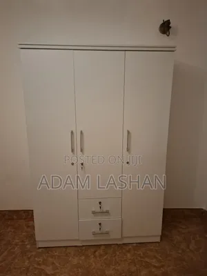 Light Used 2 Bedroom Set With 2 King Sized Spring Mattress and 2 Sofas