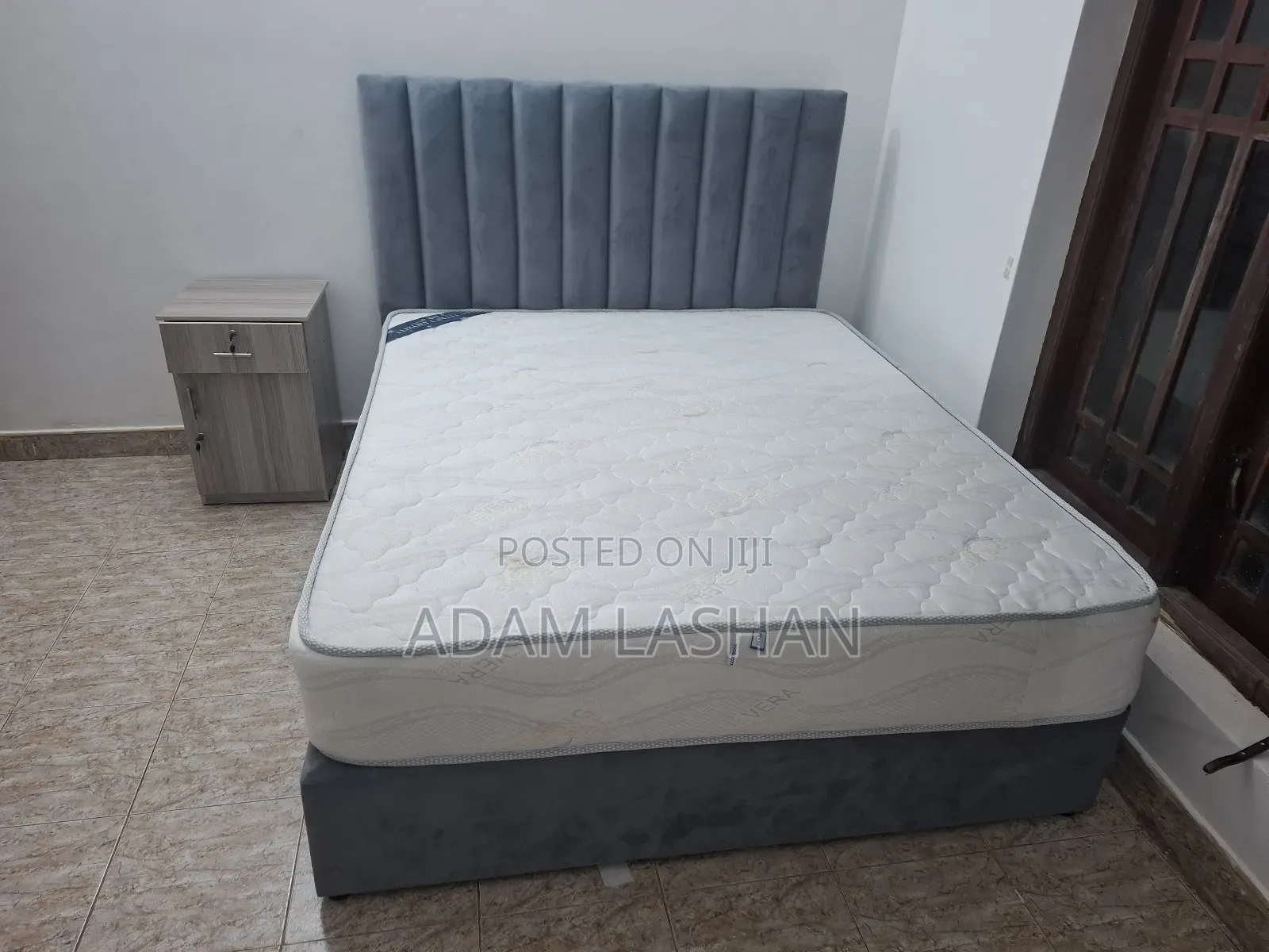 Light Used 2 Bedroom Set With 2 King Sized Spring Mattress and 2 Sofas