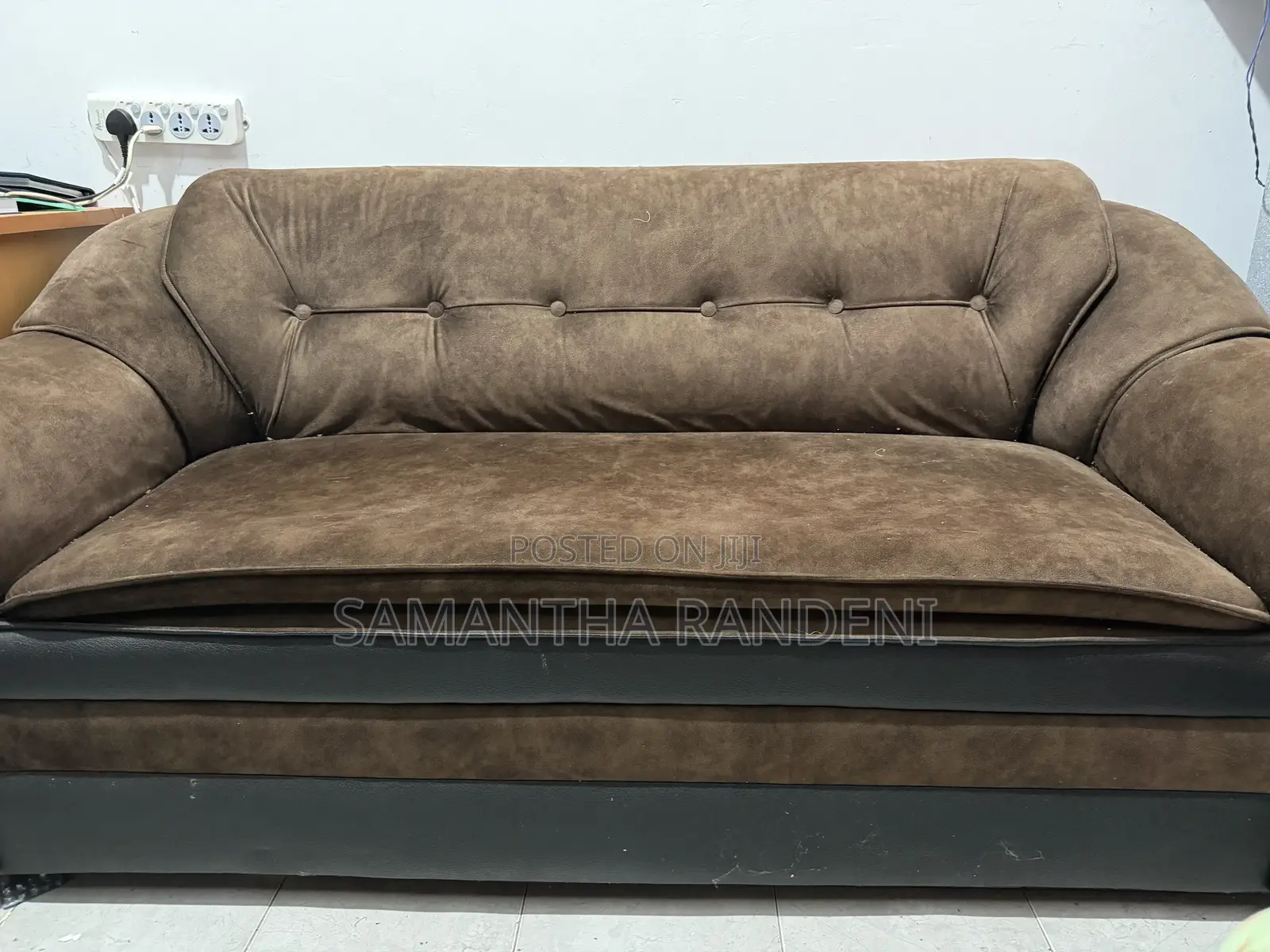 This Is a Brown and Black Fabric Priyesta Sofa Set