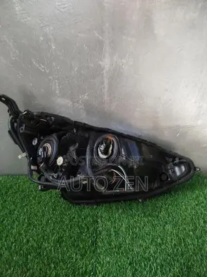 Aqua NHP10 Mdl Headlight