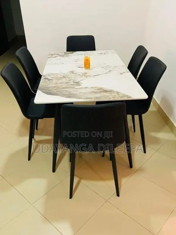 dining table with cushion chairs