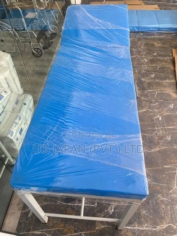 Head Adjustable Examination Bed