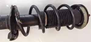 Nissan Note E12 Front Shock L/h