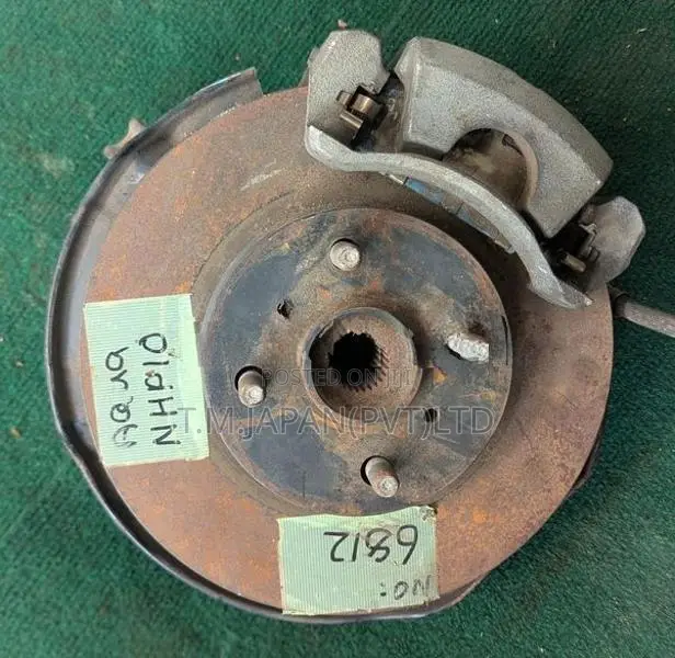 TOYOTA AQUA NHP-10 FRONT WHEEL HUB WITH BRAKE CALIPER