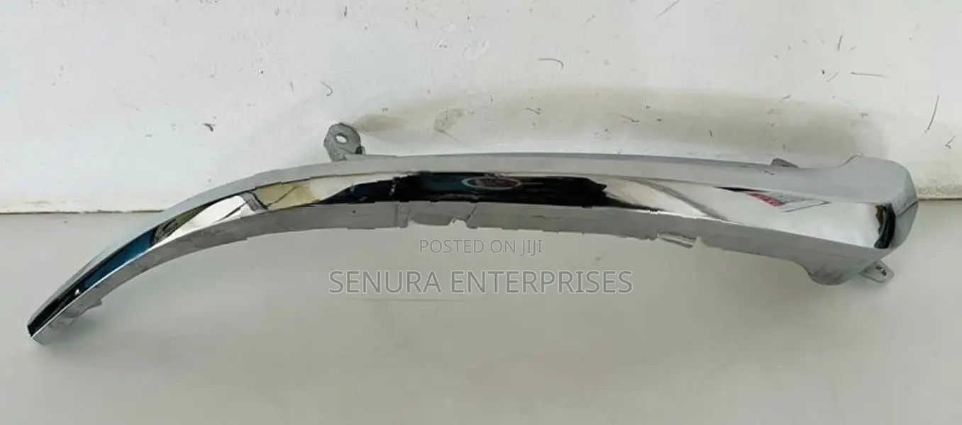 Suzuki Specia Mk53 Head Light Garnish L/h