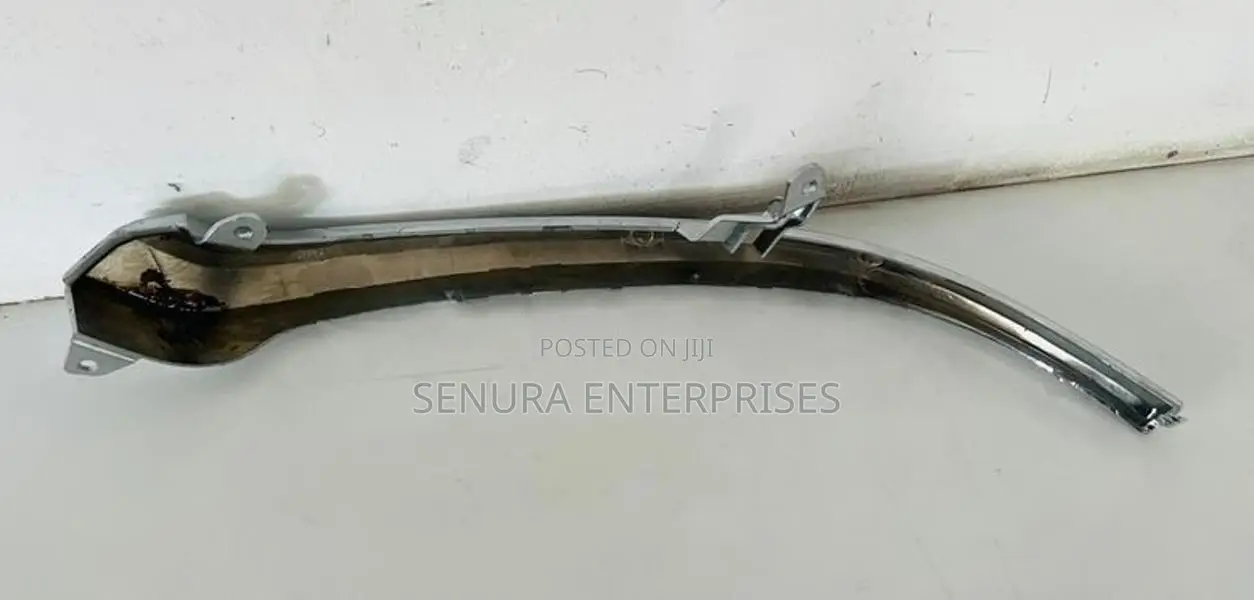 Suzuki Specia Mk53 Head Light Garnish L/h