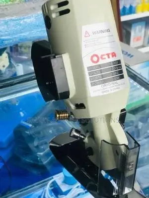 RS-100 Cloth Cutting Machine OCTA Fabric cutter