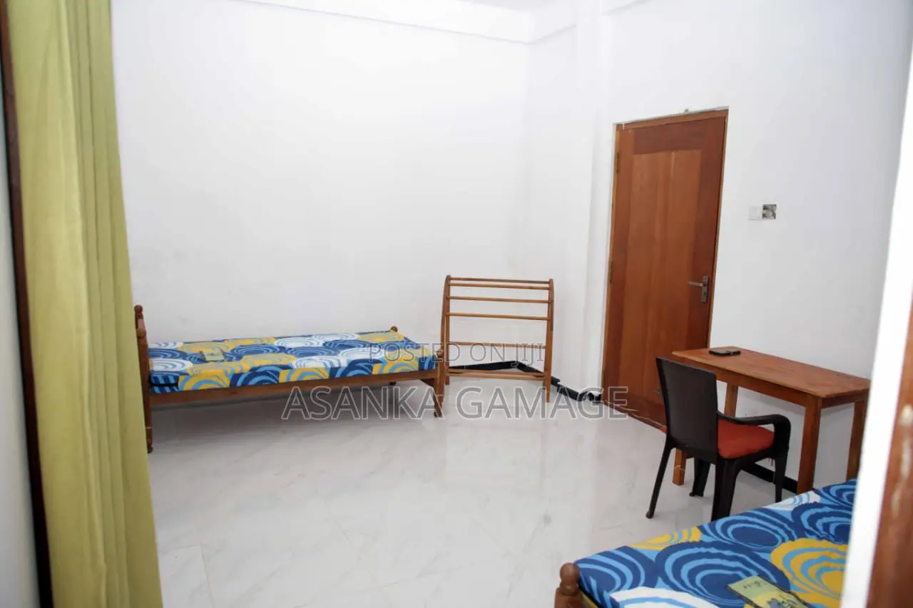 A Room With Two Beds. Small Kitchen. Attach Bathroom