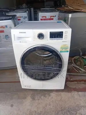 LG' WASHING MACHINE.
