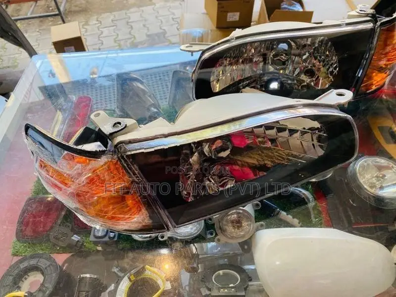 AE110 Head Lamps Set