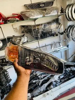 AE110 Head Lamps Set