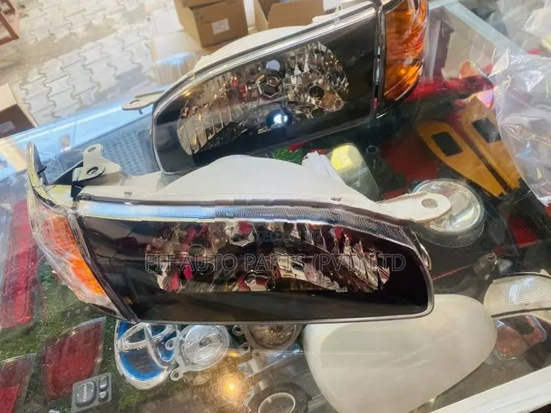 AE110 Head Lamps Set