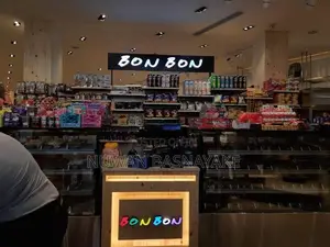 Storefront with Neon Illuminating Signs