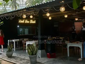 Storefront with Neon Illuminating Signs
