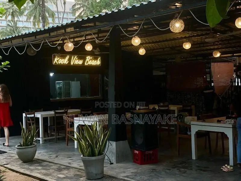 Storefront with Neon Illuminating Signs