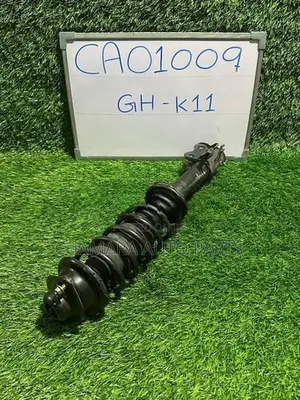 Nissan March (GH-K11) Front Shock