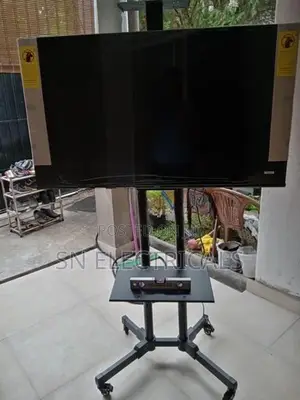 Trolley Movable Smart TV Stand 32″–65″ | Height Adjustable