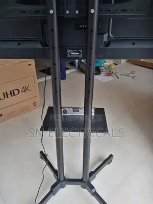Trolley Movable Smart TV Stand 32″–65″ | Height Adjustable