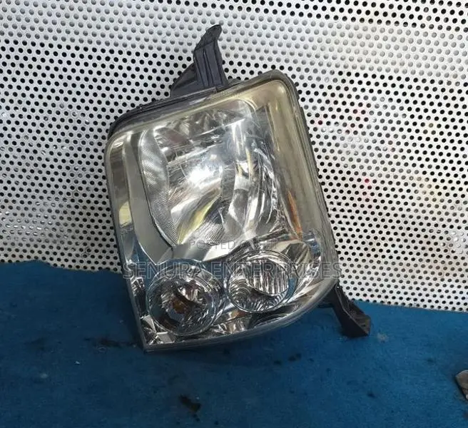 SUZUKI EVERY DA64W HEAD LIGHT LH