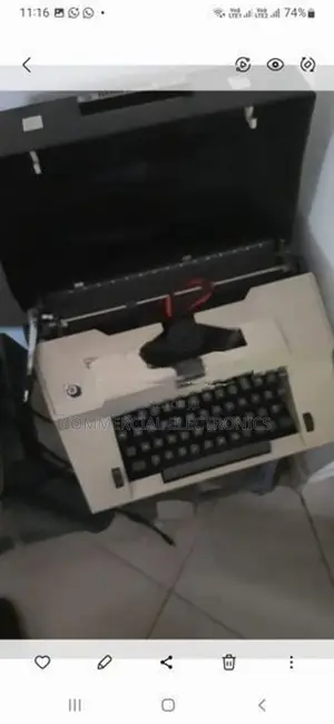 Portable typewriter දිග කැරේජය සහිත