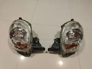 DAIHATSU CAST ACTIVA HEAD LIGHT PAIR