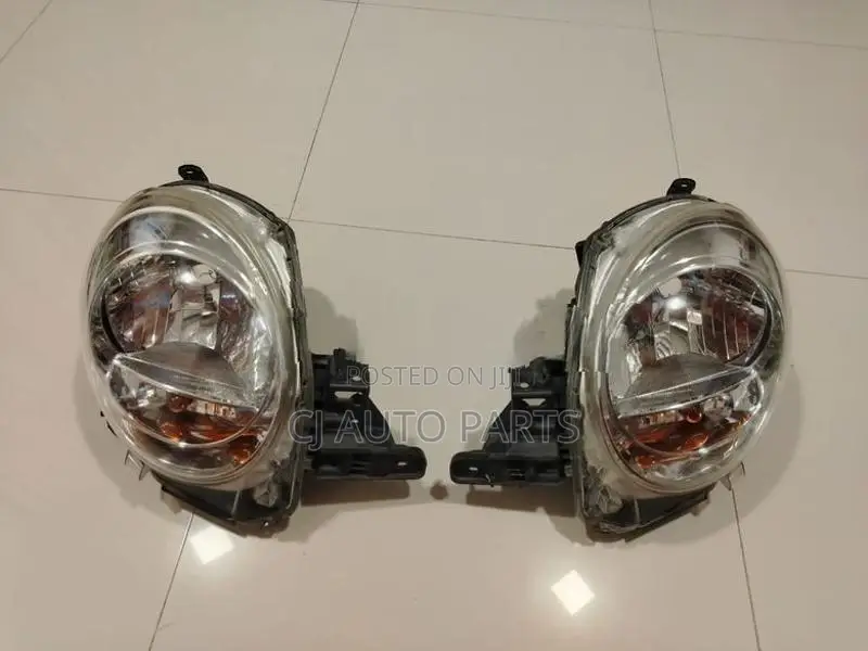DAIHATSU CAST ACTIVA HEAD LIGHT PAIR