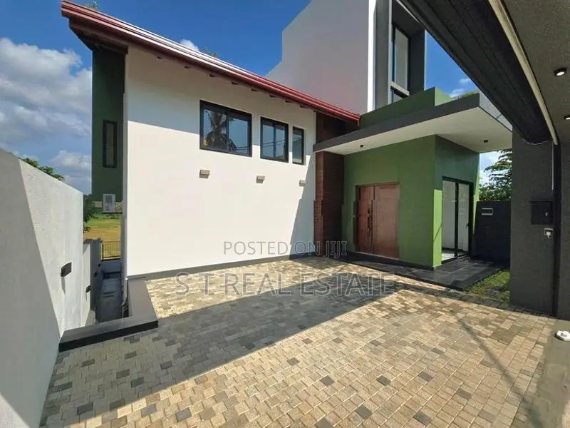 Paddy Field Facing Luxury 3 Storey House for Sale in Homagama