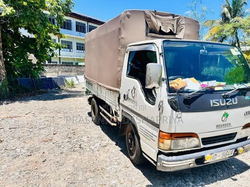 Isuzu 150 ELF (NHR69E) 1999