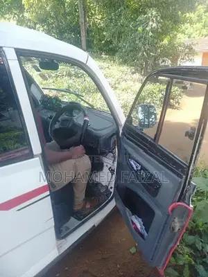 Bajaj Qute White 2019
