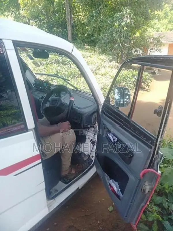 Bajaj Qute White 2019