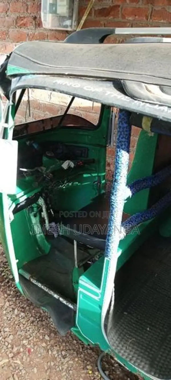 Bajaj RE 2013