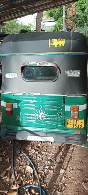 Bajaj RE 2013