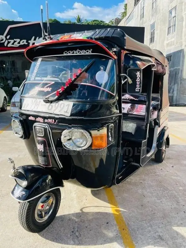 Bajaj RE 2011