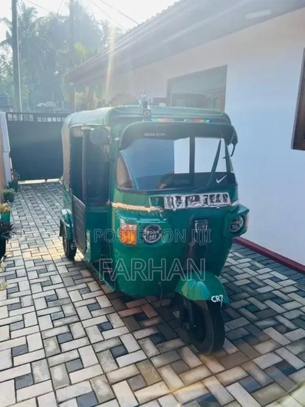Bajaj RE 2014