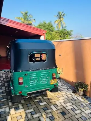 Bajaj RE 2014