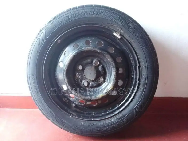 Dumlop Tire and Rim 155/65R14
