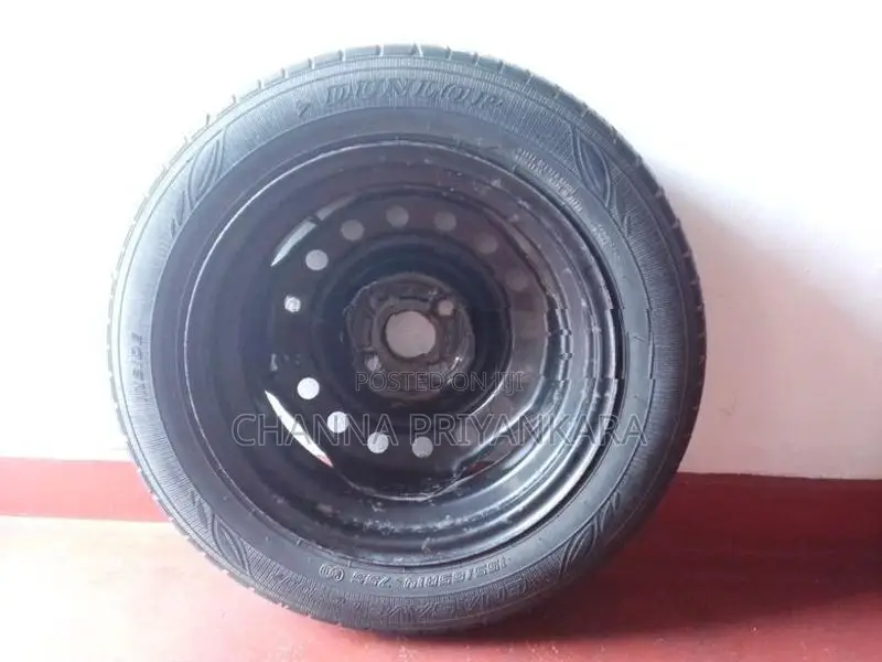 Dumlop Tire and Rim 155/65R14