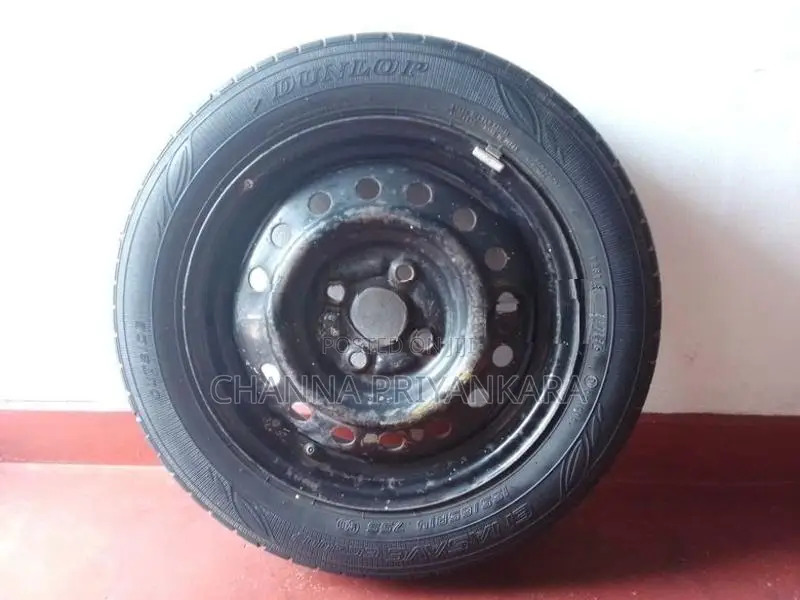Dumlop Tire and Rim 155/65R14