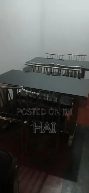 Glass Top Table with Steel Chairs