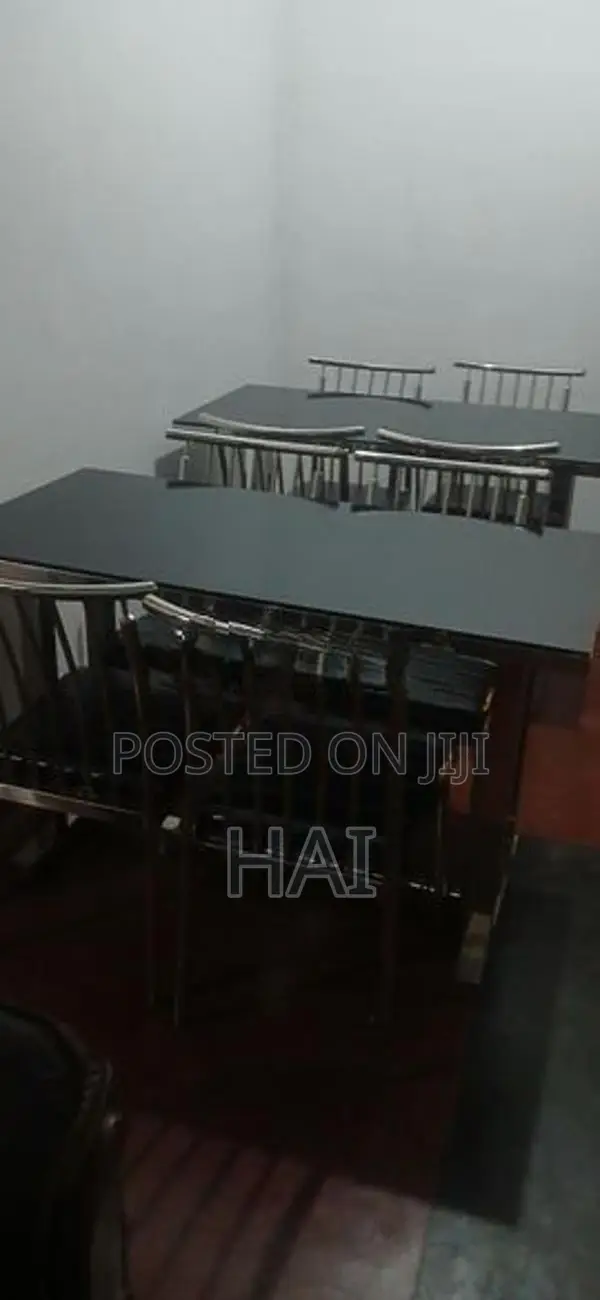 Glass Top Table with Steel Chairs