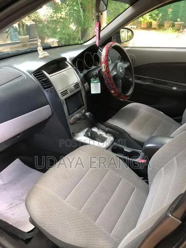 Nissan Wingroad 2004