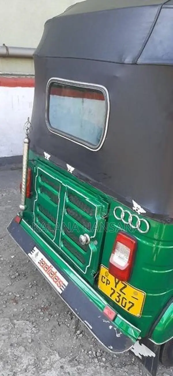 Bajaj RE 2011