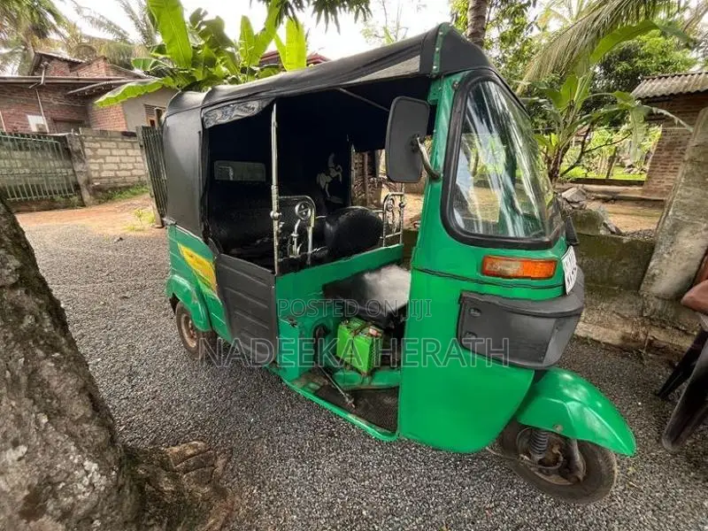 Bajaj RE 2014